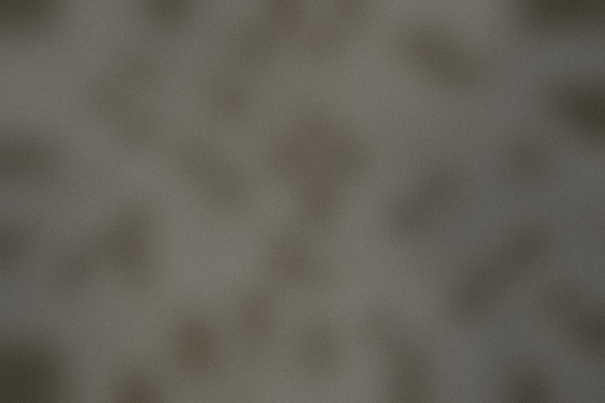 Bubbles rising in the third day of an active ferment.
